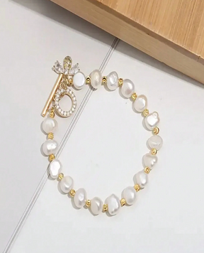 Pulseira feminina com pérola branca