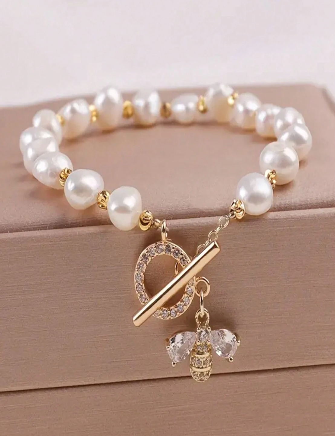 Pulseira feminina com pérola branca